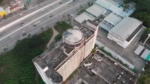 Drone view of an abandoned hotel close to highway in Chiang Mai, Lampang Road Stock Footage 237819556