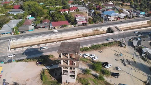 Drone view of an abandoned tower coffee shop close to highway in Chiang Mai 動画素材 238628527