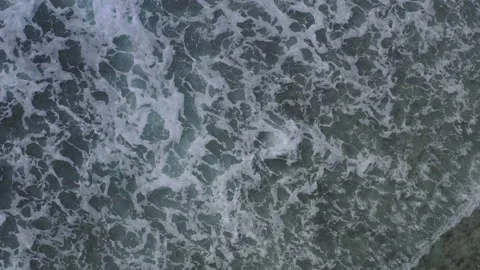 Drone view from above of clear water crashing in waves La Digue Seychelles Stock Footage 152261357