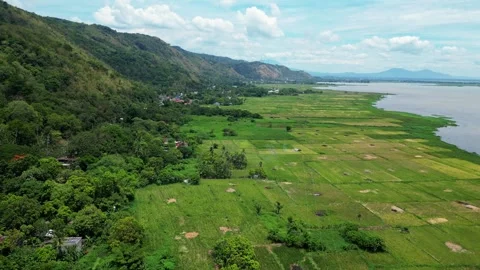 Drone view above Pakil, Laguna capturing the harmony between Filipino 库存影片 341065995