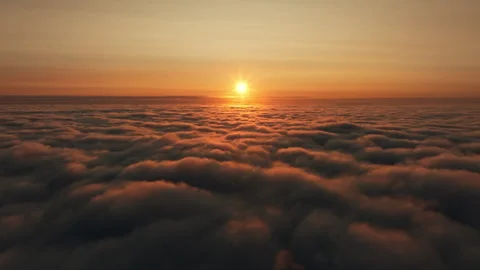 Drone view above scenic clouds at sunset, horizon view Stock Footage 258270838