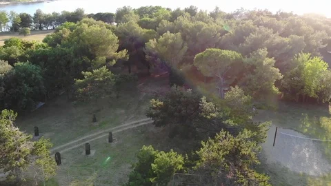 Drone view above a stadium and a lake Stock Footage 112333274