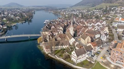 Drone view above Stein am Rhein old town, church steeple, bridge, roo Stock Photos