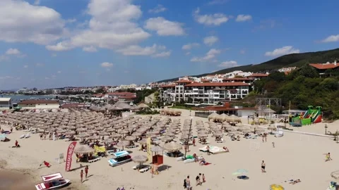 Drone view from above of sunbeds, sun umbrellas and beach in Sveti Vlas Stock Footage 276426833