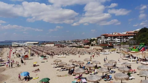 Drone view from above of sunbeds, sun umbrellas and beach in Sveti Vlas Stock Footage 276426845