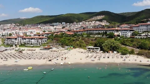 Drone view from above of sunbeds, sun umbrellas and beach in Sveti Vlas Stock Footage 276426850