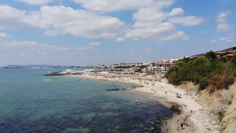 Drone view from above of sunbeds, sun umbrellas and beach in Sveti Vlas Stock Footage 276426873
