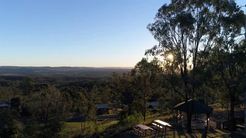 Drone View of Afternoon Sun Through Trees Stock Footage 78233790