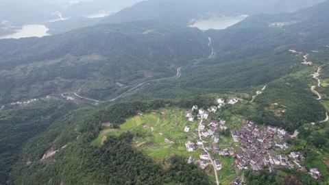 Drone view of agriculture rice fields and local Hui style buildings Stock Footage 285699514