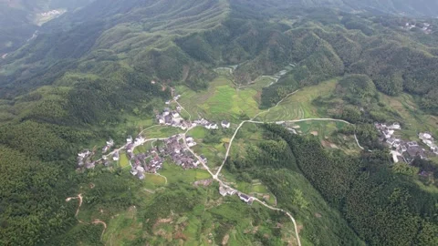 Drone view of agriculture rice fields and local Hui style buildings Stock Footage 285699663