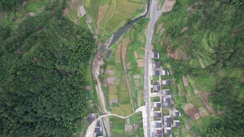 Drone view of agriculture rice fields and local Hui style buildings Stock Footage 285703730