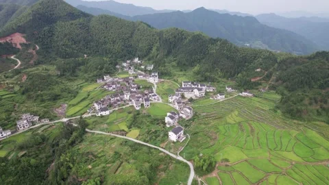 Drone view of agriculture rice fields and local Hui style buildings Stock Footage 285705173