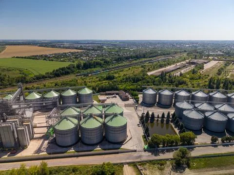 Drone View of Agroindustrial Complex with Grain Silos and Water Reservoir Fotos Stock