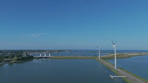 Drone View Along Dike With Wind Turbines Near Enkhuizen Stock Footage 339681972