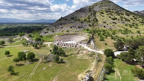 Drone View of Ancient Amphitheater and Rocky Hill Stock Footage 333045174