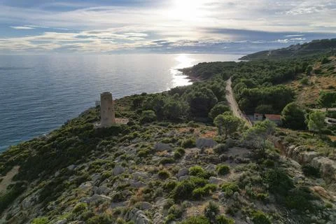 Drone view of an ancient medieval tower of Mediterranean Sea coast defence in Stock Photos