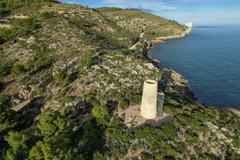 Drone view of an ancient medieval tower of Mediterranean Sea coast defence in Stock Photos