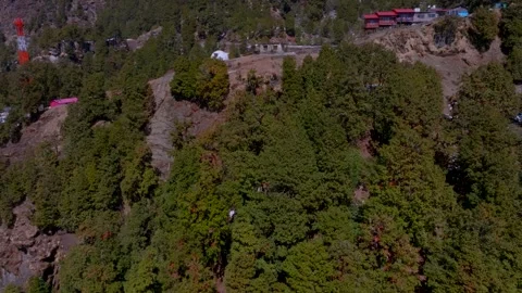 Drone view and beautiful snow mountain and small village where Snow fall in.. Stock Footage 325487958
