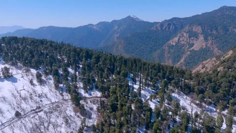 Drone view and beautiful Snow mountains in winter season 動画素材 325489096
