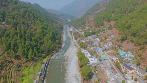 Drone view and River flowing between the mountains in Uttarakhand and Thara.. Video stock 304422076
