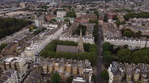 Drone view of an Anglican church overlooking Kensington, London. Stock Footage 201863250