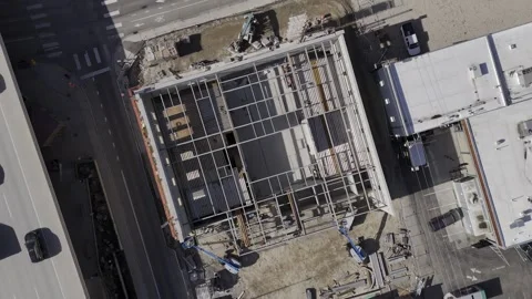 Drone view of apartment project under construction looking straight down Stock Footage 277140038