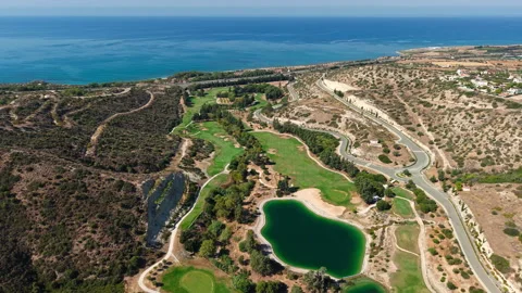 Drone View of Aphrodite Hills Secret Valley Golf Course on Cyprus on Hot Sunny Vídeos de archivo 346656261