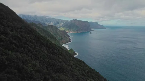 Drone view of the Atlantic ocean coast and the mountains of Madeira Stock Footage 304345244