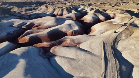 Drone View of ATV Vehicle Moving on Road on Hills in Desert Landscape of Utah Stock Footage 346245815