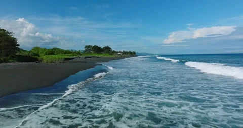 Drone view of Bali. Top view of wave on Keramas beach with black sand Stock Footage 242831069