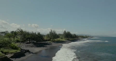 Drone view of Bali. Top view of wave on Keramas beach with black sand Stock Footage 243693418