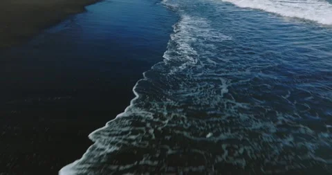 Drone view of Bali. Top view of wave on Keramas beach with black sand Stock Footage 243877768