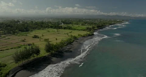 Drone view of Bali. Top view of wave on Keramas beach with black sand Stock Footage 244655920