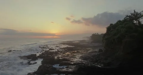 Drone view of Bali. Top view of wave on Keramas beach with black sand Stockbeeldmateriaal 244656359