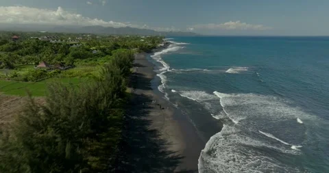 Drone view of Bali. Top view of wave on Keramas beach with black sand Stock Footage 245326639
