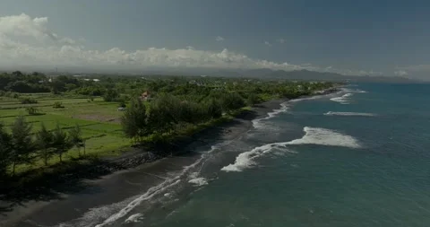 Drone view of Bali. Top view of wave on Keramas beach with black sand 스톡 동영상 246519140