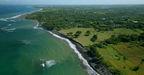 Drone view of Bali. Top view of wave on Keramas beach with black sand Stock Footage 246519147