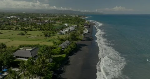 Drone view of Bali. Top view of wave on Keramas beach with black sand Stock Footage 246660192