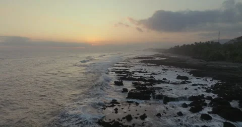 Drone view of Bali. Top view of wave on beach with rocks Stock Footage 248595983