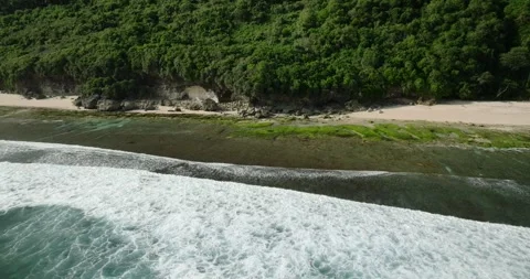 Drone view of Bali. Top view of blue wave on Nyang Nyang beach at low tide Stock Footage 270792673