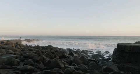 Drone view of Bali. View of bwave on beach with stones Stock Footage 246519115