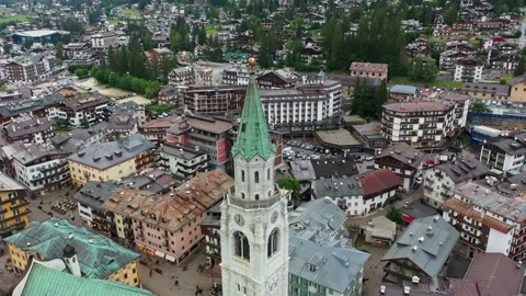Drone view of Basilica Minore dei Santi Filippo e Giacomo in Cortina d'Ampezzo Stock Footage 196126312
