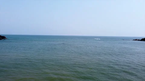 Drone view in beach camera focuing on speed boat Stock Footage 276910878