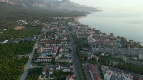 Drone view of the beach on the Mediterranean coast at dawn. Mountains, beach. 4k Stock Footage 217871669