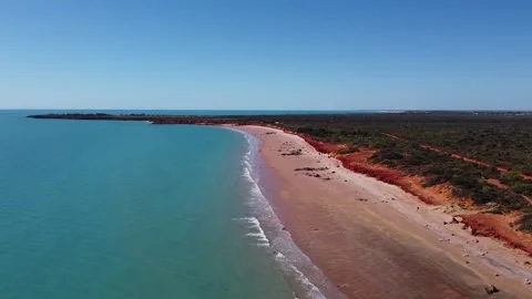 Drone view, beach, red sand, blue ocean, red desert, Australia Stock Footage 172529719
