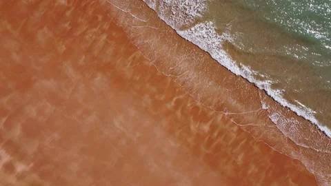 Drone view, beach, red sand, blue water, ocean in Australia Stock Footage 172529982