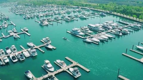 Drone view of a beautiful harbor and many white boats Stock Footage 233674211