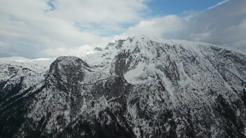 Drone view a beautiful mountain range with snow during winter Stock Footage 263348982