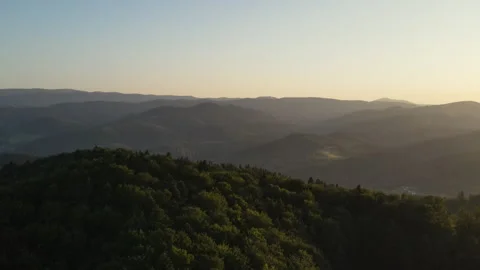 Drone view of beautiful mountains at sunset or sunrise in summertime Stock Footage 323705966