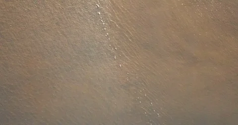 Drone view of beautiful seamless never ending footage while turquoise sea waves  Stock Footage 121082103